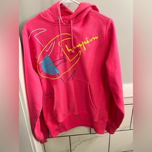 Pink champion hoodie, fleece inside.